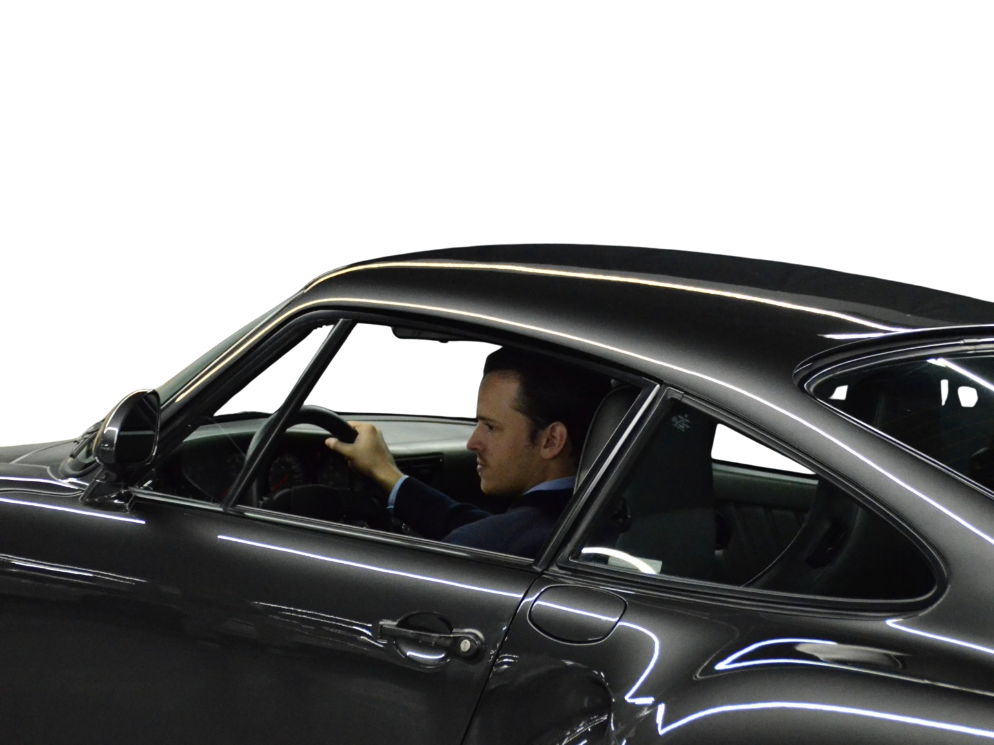 Santiago Garcia Rosa at the wheel of a classic Porsche 911